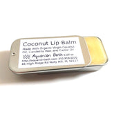 Coconut lip balm in metal tin with yellow balm, Aquarian Bath label visible