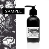 Facial cleanser bottle with black liquid, pump dispenser, and Leaf Seed Berry label