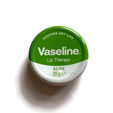 Round blue Vaseline Aloe Lip Therapy tin with white label, sealed and new, showcasing smooth balm texture