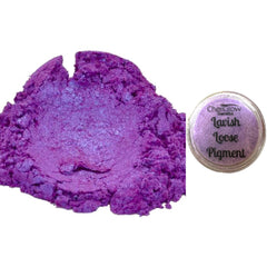 Loose pigment powder in purple, with CheriGlow Cosmetics branding and text "Lavish Loose Pigment" visible