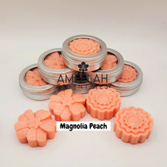 Close-up of golden shea butter lotion bar with smooth texture and natural swirls, resting on marble surface