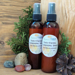 Facial cleansing spray, brown glass bottles with black spray tops, "Quench" brand label