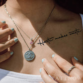 Elegant semi-permanent tattoo sticker with delicate script design on clean skin, measuring 11.1x17cm