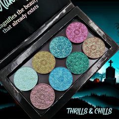 Side view of Faboolous Duochrome Eyeshadow pot showcasing its iridescent purple-green shift in natural light