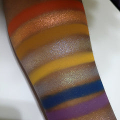 Side view of Fruitful End, Sweet Beginning Eye Shadow palette showing gradient of pink and gold shades in sleek compact