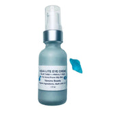 Eye cream bottle with blue glass, silver cap, and Navoms Beauty label