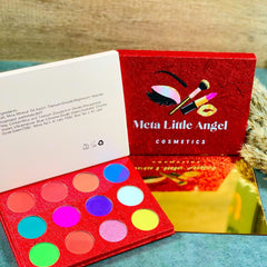 Side view of 12-color glitter eyeshadow palette showing shimmer shades in gold, pink, and bronze tones