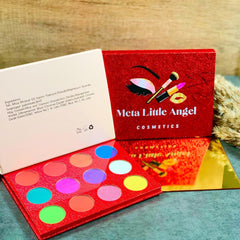 Close-up of 12 shimmering eyeshadow shades in gold, bronze, and plum with glitter particles