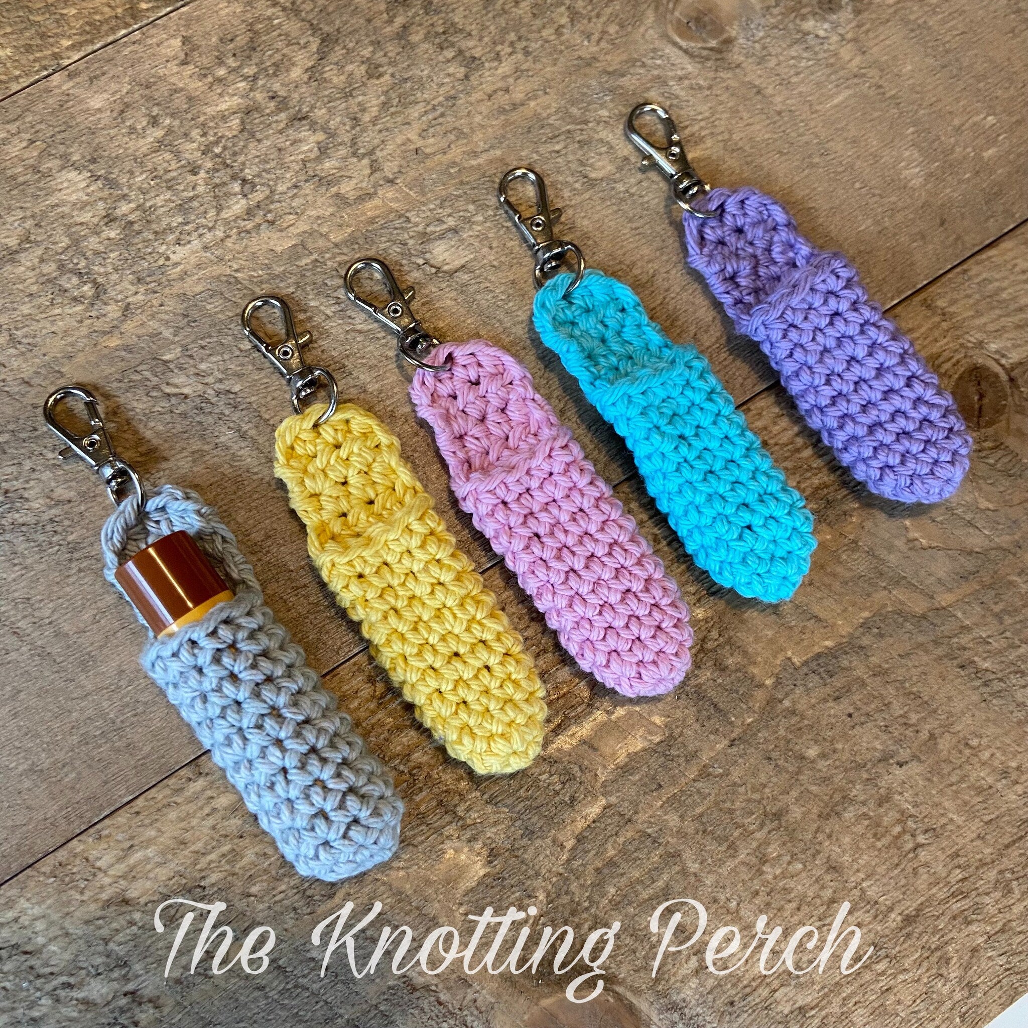 Crochet lip balm holder, colorful crochet, with keychains, The Knotting Perch brand name visible