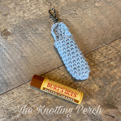 Crochet lip balm holder, light blue cotton, handmade by The Knotting Perch, with lip balm visible