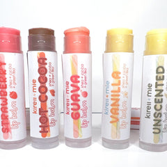 Lip balms with colorful balm, white label, and Kireiimie branding visible on packaging