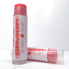 Lip balm with red and white packaging, Kireiimie Strawberry lip balm, two tubes shown