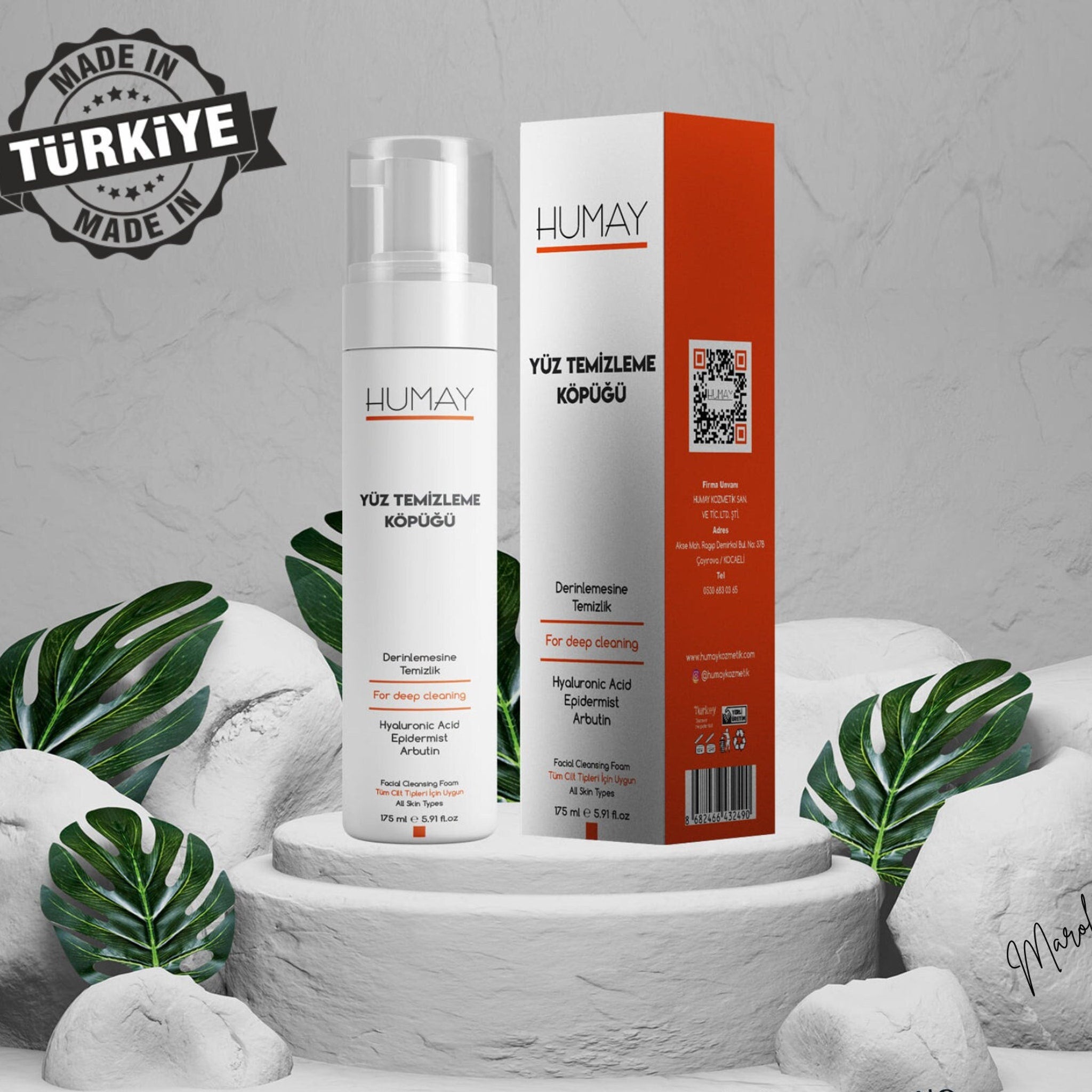 Facial cleanser foam bottle and box, white and orange packaging, brand HUMAY visible