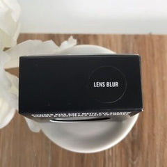 Eye shadow box, black rectangular packaging with white "LENS BLUR" text on a white plate