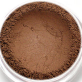 Eyeshadow powder, matte dark brown color, close-up view in clear jar