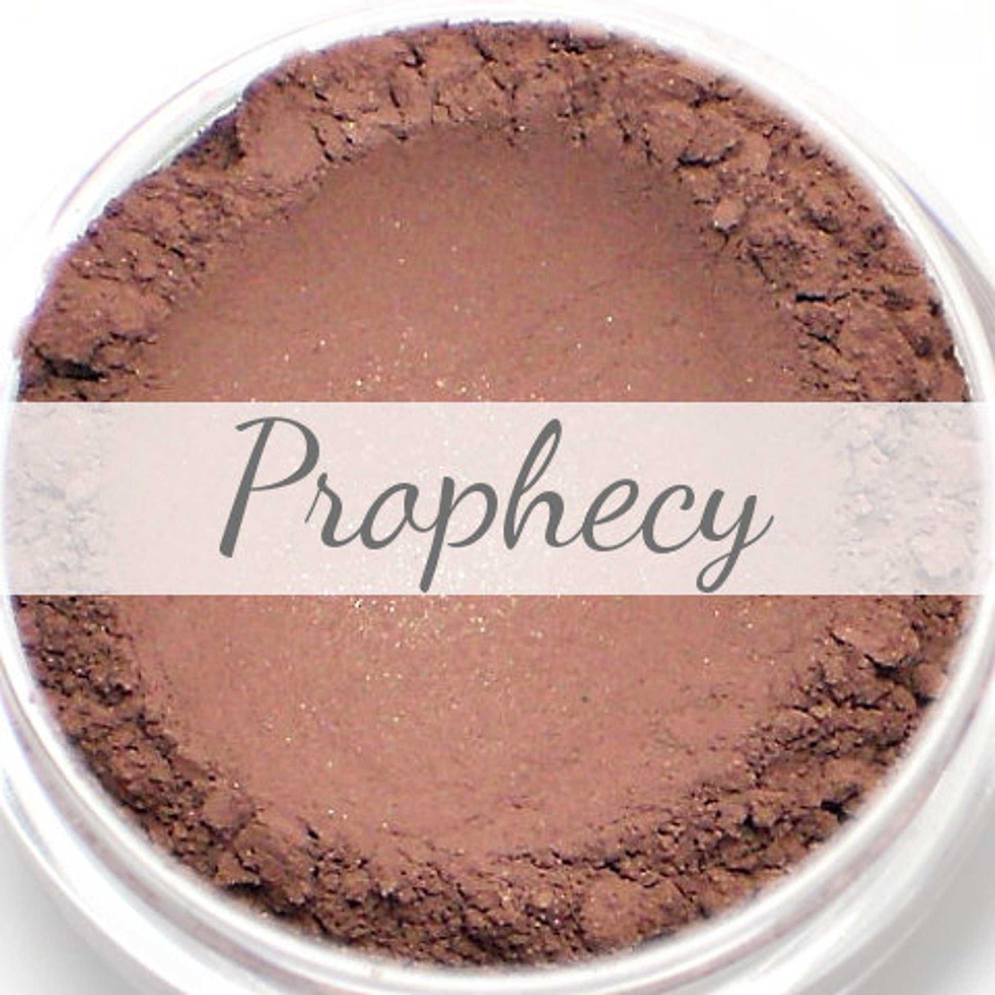 Burgundy plum and copper shimmer vegan mineral eyeshadow in compact with metallic finish.