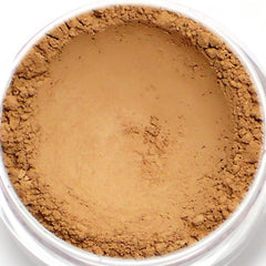 Close-up of peachy brown matte eyeshadow pan with smooth, velvety texture and vegan mineral pigment