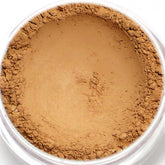 Eyeshadow tan matte powder in clear jar, loose pigment