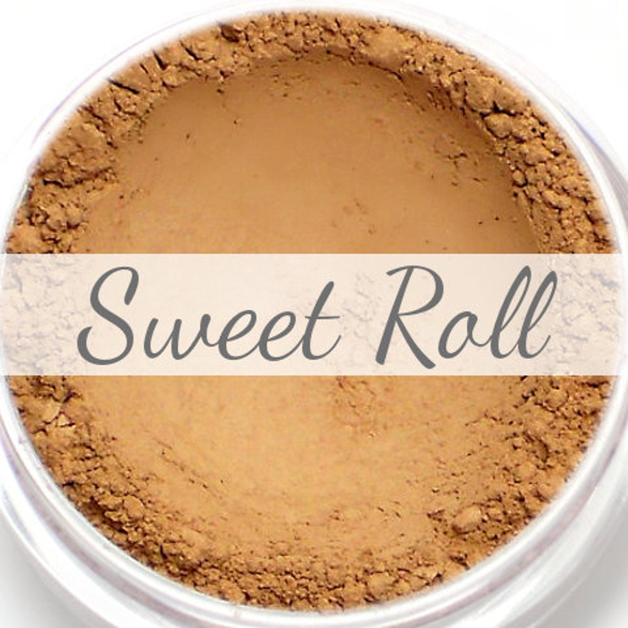 Peachy brown matte vegan eyeshadow in round compact with soft pink packaging