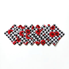 Coasters with red floral pattern and black and white gingham design