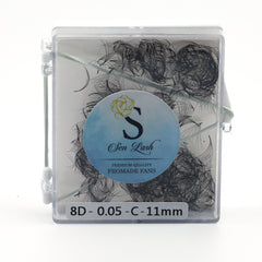 Eyelash extensions in clear plastic case with black lashes and Sen Lash label