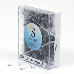 Eyelash extensions in a clear plastic case with black lashes and Sen Lash branding