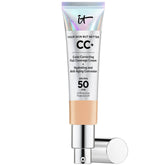 Face makeup tube with silver cap, light beige product, and IT Cosmetics text