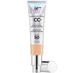Face makeup tube with silver cap, light beige product, and IT Cosmetics text