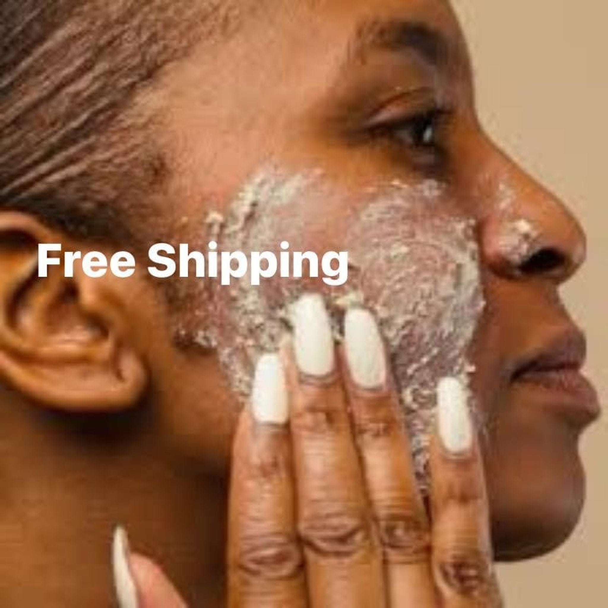 Skin care mask on face, beige mask texture, hand applying, "Free Shipping" text visible