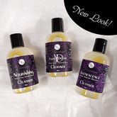 Facial Cleansers, clear bottles with black caps, purple labels with "Véronique" text, on white surface