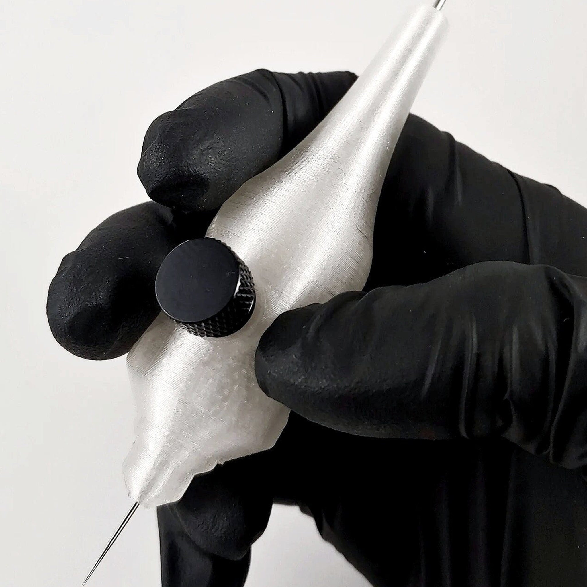 Silver 25mm handpoke skincare tool with smooth rounded tip for gentle facial treatments