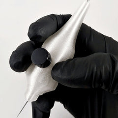 Silver 25mm handpoke skincare tool with smooth rounded tip for gentle facial treatments