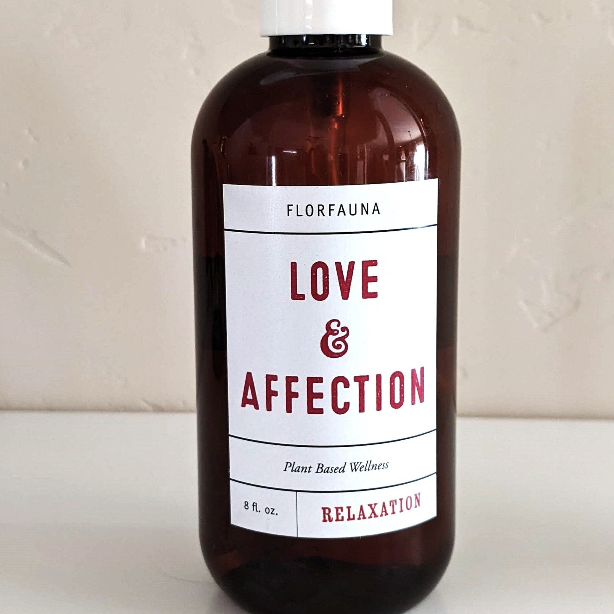 Aphrodisiac spray bottle, brown glass, white label with red text, Florfauna brand