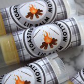 Lip balm tubes with plaid labels, "Toasted Marshmallow" text, and clear plastic caps