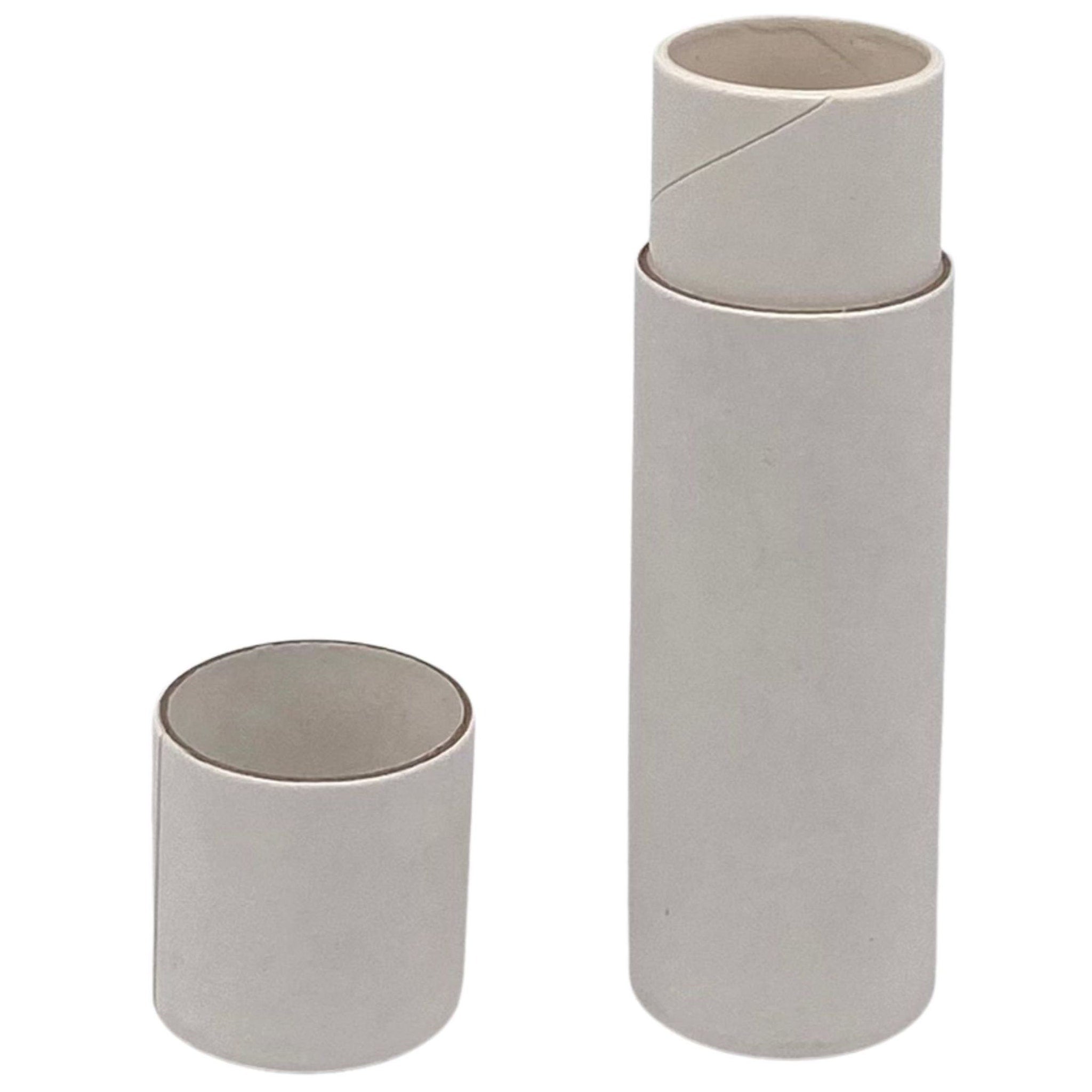 Cosmetic tube, white cardboard cylinder, open lid, two pieces, packaging for product