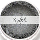 Vegan eyeshadow, silver metallic powder, with "Sylph" text overlay