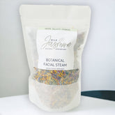 Facial steam bag, white paper bag, colorful dried herbs, Wild Jasmine branding visible