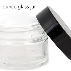 Glass jar with clear glass and black lid, partially open to show contents