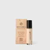Eye serum roll-on, beige glass bottle with black cap, Bioterra brand name visible, and matching box