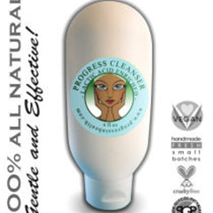 Facial cleanser bottle, white plastic, blue label with woman graphic, Erzulie Cosmetics