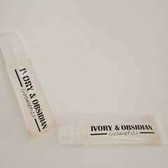 Lip gloss tubes, clear plastic, Ivory & Obsidian Cosmetics, pink tint inside