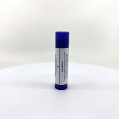 Lip balm tube with blue cap and white label, Lake Michigan Lavender & Eucalyptus branding