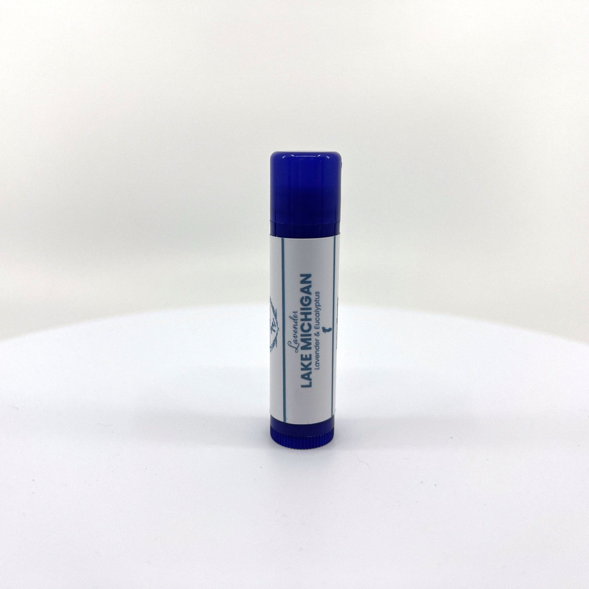 Lip balm tube with blue cap and label, "Lake Michigan Lavender & Eucalyptus" text