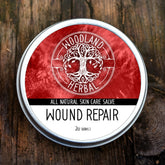 White plastic jar of wound repair salve with minimalist black label and matte finish, 2oz size