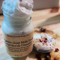 Facial scrub cleanser in glass jar with white cream and brown label Quiet Creek Soap Co.