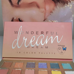 Side view of Wonderful Dreams Eye Shadow palette showing gradient of shimmering purple and pink hues