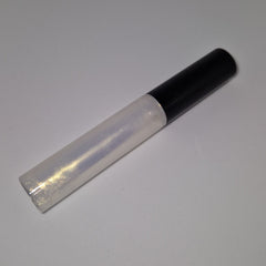 Lip gloss tube with clear, iridescent liquid and black cap, angled view