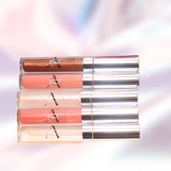 Lip gloss tubes with various colors, silver caps, and Monet brand text visible