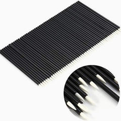 Close-up of 50 disposable eyeliner brushes with fine tapered tips in clear plastic packaging