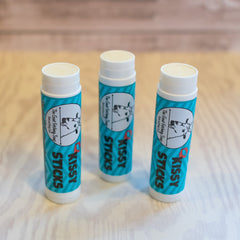 Kissy Sticks, blue and white striped tube with brand logo and text, The Goat Fetching Soap